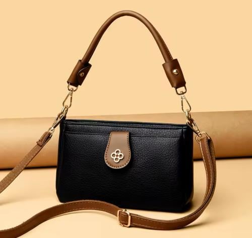 ‎حقيبة أم جلدية محمولة متعددة الطبقات ذات سعة كبير...