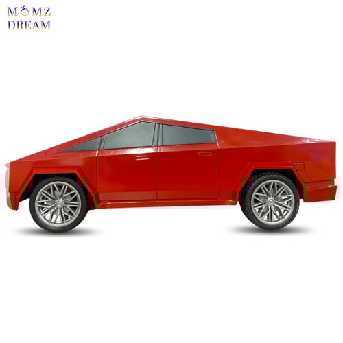 سيارة تسلا ، مع جهاز تحكم عن بعد للأطفال.