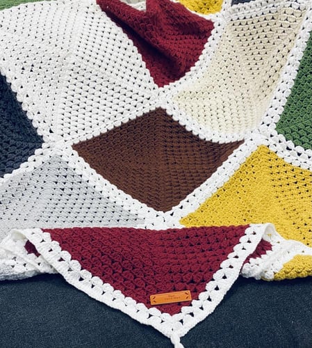 مفرش مربعات حَوْكَة