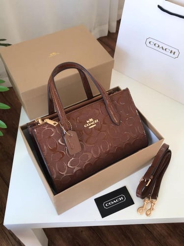 شنطه ماركه كوتش لمعه