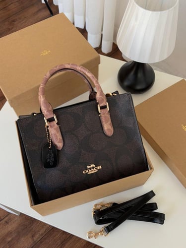 شنطه ماركه كوتش