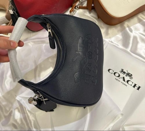 شنطه ماركه كوتش