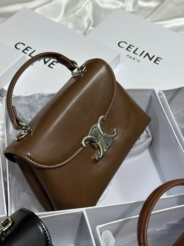 شنطه ماركه سيلينا لوقو فضي