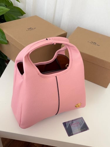 شنطه ماركه كوتش