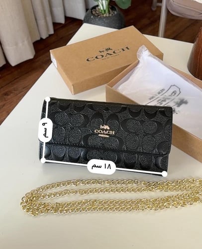 شنطه ماركه كوتش