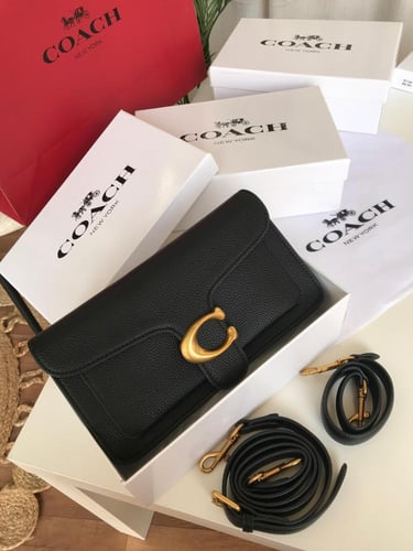 شنطه ماركه كوتش وسط