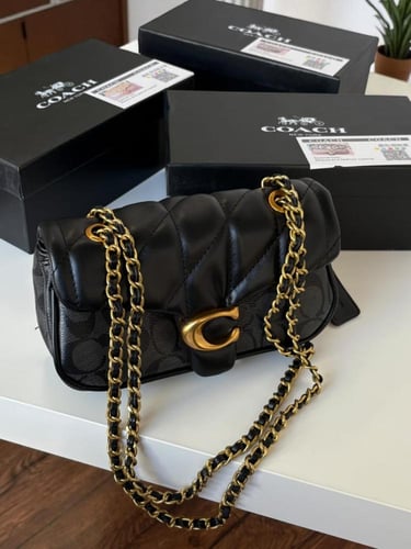 شنطه ماركه كوتش