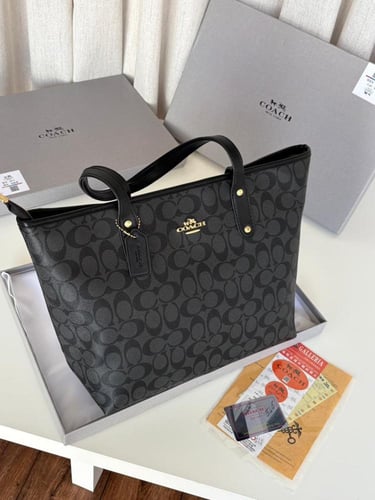 شنطه ماركه كوتش