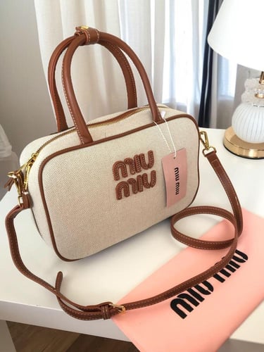 شنطه ماركه ميو ميو وسط