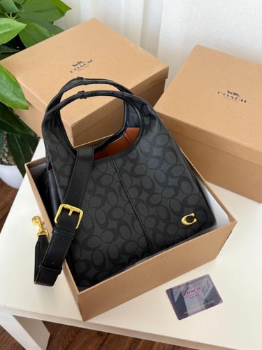 شنطه ماركه كوتش