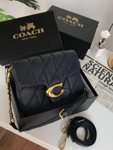 شنطه ماركه كوتش