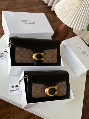 شنطه ماركه كوتش