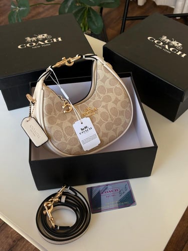 شنطه ماركه كوتش صغير