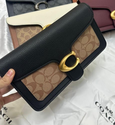 شنطه ماركه كوتش