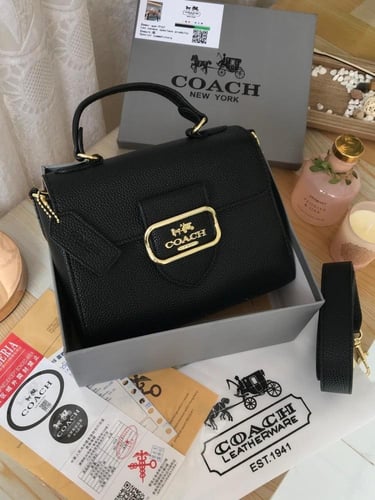 شنطه ماركه كوتش