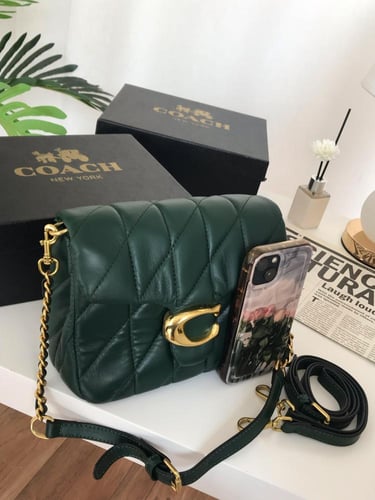 شنطه ماركه كوتش