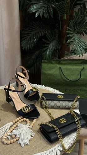 طقم ماركه قوتشي