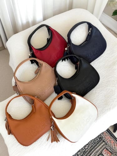 شنطه ماركه كوتش