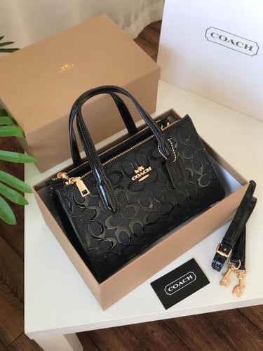 شنطه ماركه كوتش لمعه