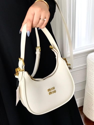 شنطه ماركه ميو ميو مطفي