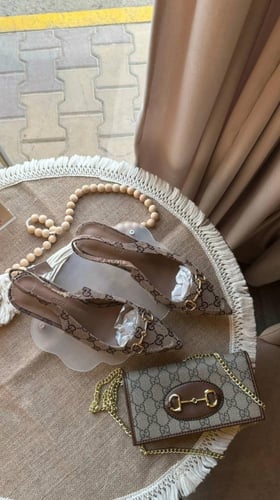 طقم ماركه قوتشي