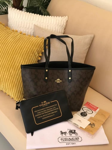 شنطة كوتش دبل فيس