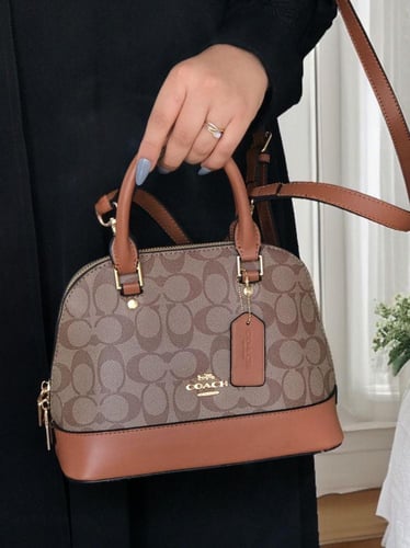 شنطه ماركه كوتش