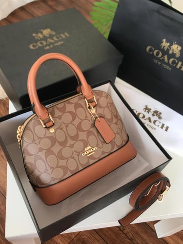 شنطه ماركه كوتش