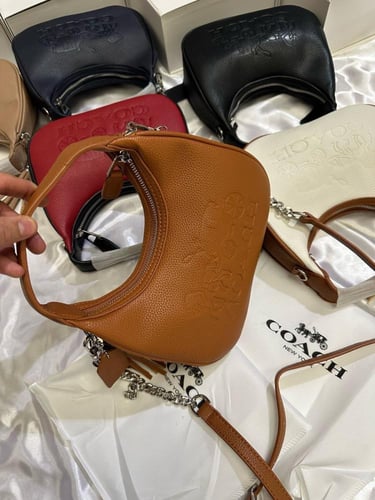 شنطه ماركه كوتش