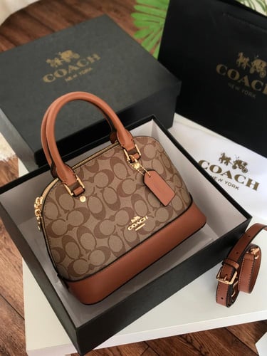 شنطه ماركه كوتش