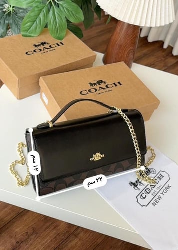 شنطه ماركه كوتش