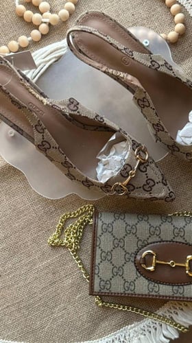 طقم ماركه قوتشي