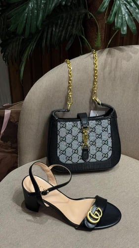 طقم ماركه قوتشي