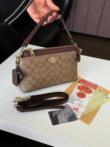 شنطه ماركه كوتش