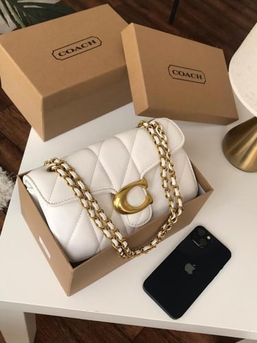 شنطه ماركه كوتش وسط