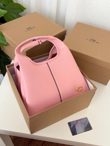 شنطه ماركه كوتش