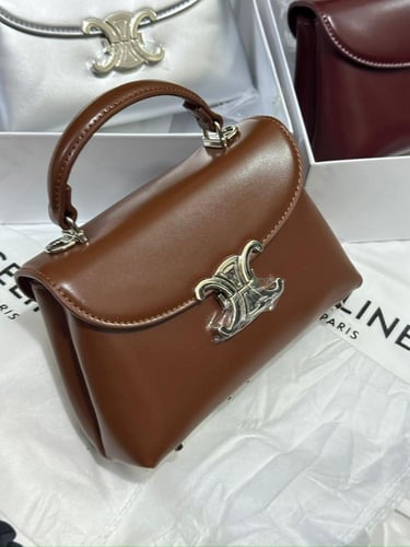 شنطه ماركه سيلينا لوقو فضي