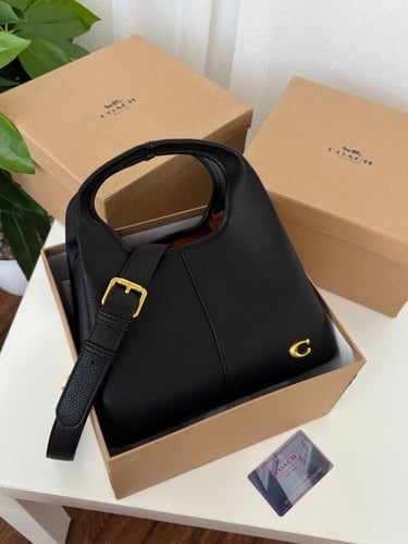 شنطه ماركه كوتش