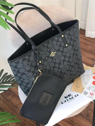 شنط ماركه كوتش كبير