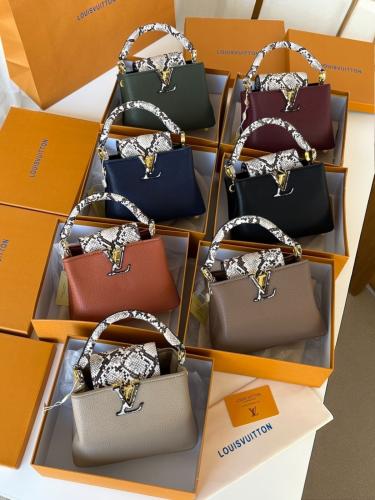 شنطه ماركه لويس فيتون جلد الثعبان