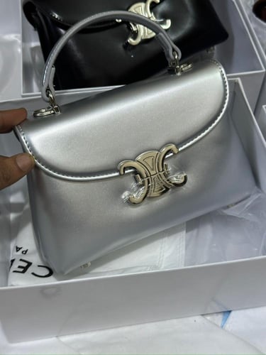 شنطه ماركه سيلينا لوقو فضي