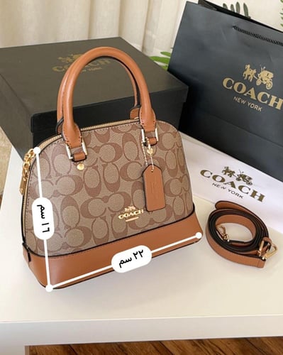 شنطه ماركه كوتش