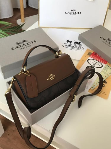 شنطه ماركه كوتش