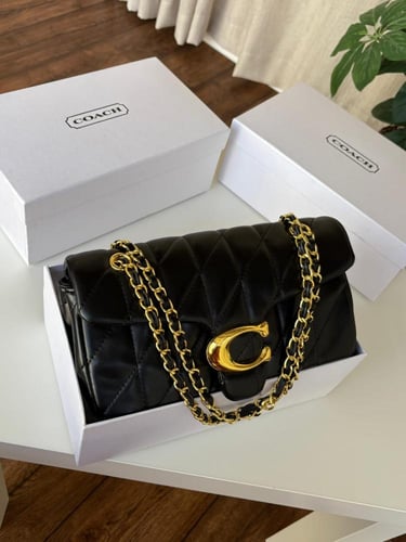 شنطه ماركه كوتش