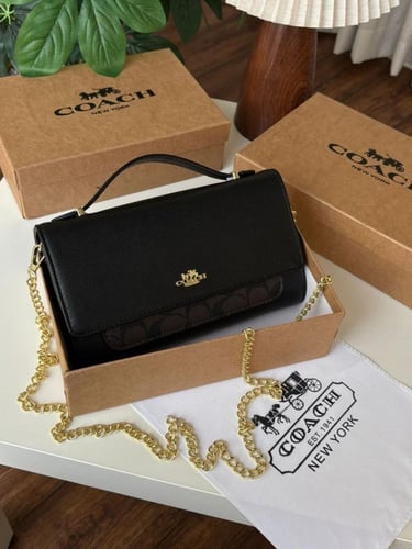 شنطه ماركه كوتش