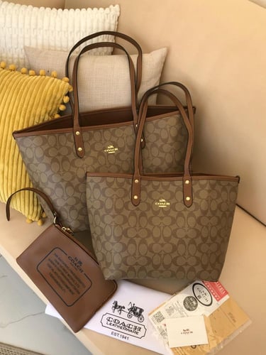 شنطة كوتش دبل فيس