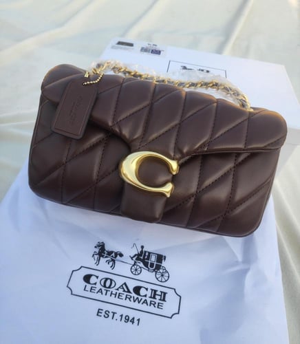 شنطه ماركه كوتش بني ماستر كواليتي