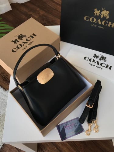 شنطه ماركه كوتش