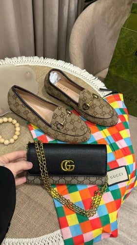 طقم ماركه قوتشي