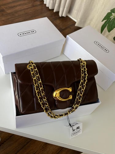 شنطه ماركه كوتش